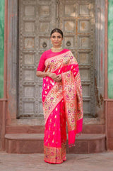 Indian women draped beautifully Cherry Blossom Crimson Pink Handwoven Banarasi Silk Saree by chinaya banaras