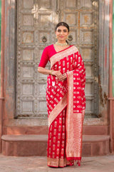 Indian women draped beautifully Crimson Cocoon Red Handwoven Banarasi Silk Saree by chinaya banaras