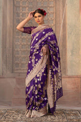 Indian women draped beautifully Indigo Wave Purple Handwoven Banarasi Silk Saree  by chinaya banaras